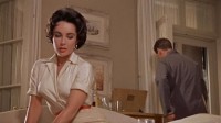 Elizabeth Taylor as "Maggie Pollitt" in CAT ON A HOT TIN ROOF