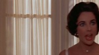 Elizabeth Taylor as "Maggie Pollitt" in CAT ON A HOT TIN ROOF