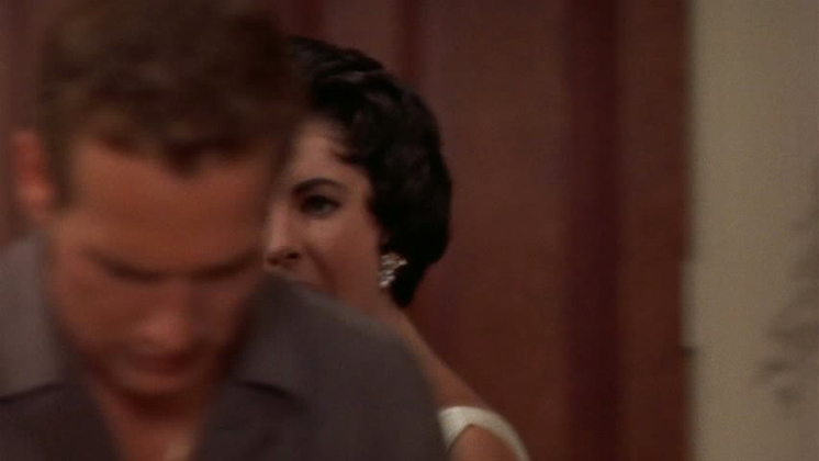Elizabeth Taylor as "Maggie Pollitt" in CAT ON A HOT TIN ROOF