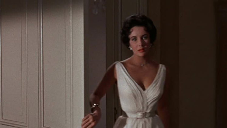 Elizabeth Taylor as "Maggie Pollitt" in CAT ON A HOT TIN ROOF