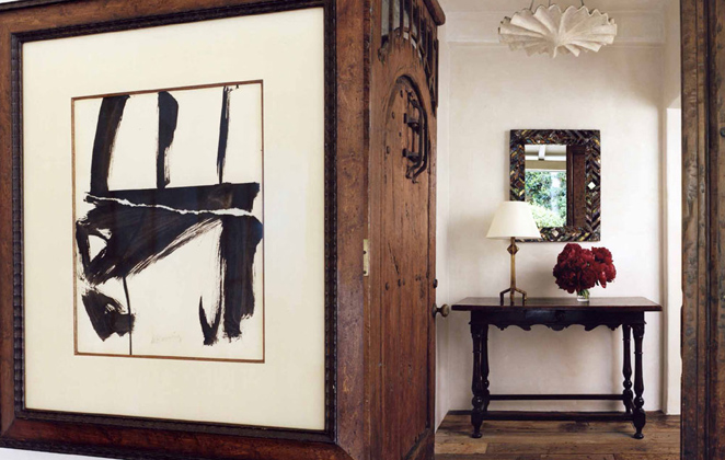 Los Angeles, California. Entry with Willem de Kooning's untitled Landscape from 1960, plaster chandelier by Alberto and Diego Giacometti, a Line Vautrin mirror, and 17th century Italian walnut table- photo by François Halard