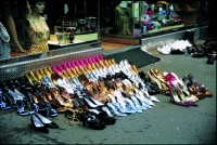 Harlem's High Heel Heaven Slash 4 Pair for $20, 2008. Photo by Barkley L. Hendricks