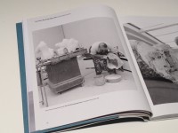 Henry Moore mixing plaster beside Two Piece Reclining Figure No. 4 in progress, Perry Green, 1961. Photo copyright John Hedgecoe
