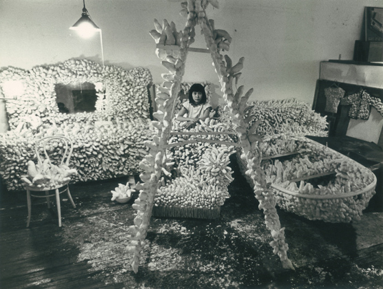 Kusama in her studio, New York, (1963-64).  Copyright Yayoi Kusama Studio, Inc.; Courtesy Ota Fine Arts, Tokyo; Victoria Miro Gallery, London; Gagosian Gallery, New York