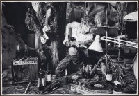 ‘Me and Conrad M. during one of our silent rehearsals with Xx Xxxxxx, our band in the becoming, surrounded by trash and bottles of a fictive whisky blend I have secretly created in the office, a huge mirror in front of us, in which we can’t stop glancing as we try to get our band’s attitude straight, and in which we both discover that we are playing out very different fantasies of rock ‘n roll life, which afterwards leads to heavy discussions over which image we have to project, fights that already cast a dark shadow over the band’s future before we have even played one single note.’ (2012)  Courtesy Galerie Zink