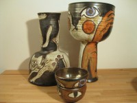 Group with: Reversible Vase with Surrealist and Ritual Cat, Large Goblet Form with Surrealist Cat-Leg-Hands, and Eye Bowls, (2012)