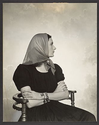 [Woman in Scarf Seated in Chair] (1930s-40s)